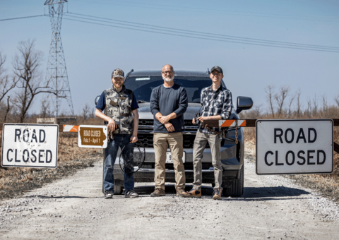 Iowa Raptor Project director Dave Conrads, center, is pictured with volunteers Aaron Petrie, left, and Caden Dorrance at the Hawkeye Wildlife Management Area in rural Johnson County.
