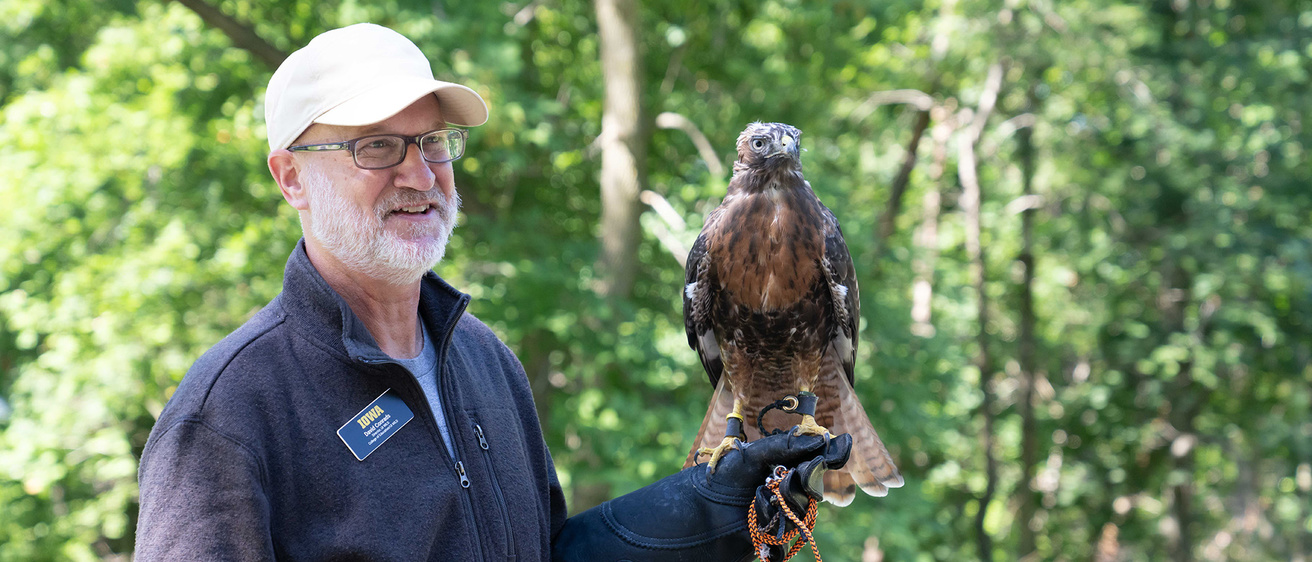 Dave Conrads, director, Iowa Raptor Project, and one of the program's raptors