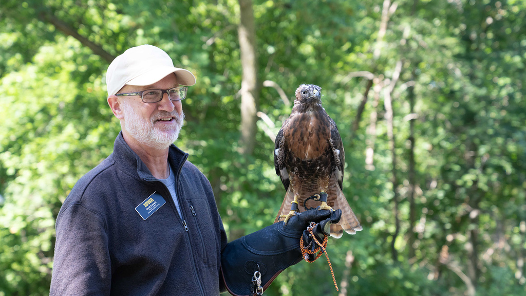 Dave Conrads, director, Iowa Raptor Project, and one of the program's raptors